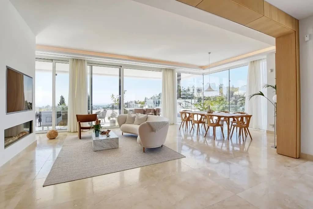 Professional property photography of an open-plan living and dining room by Photoplan